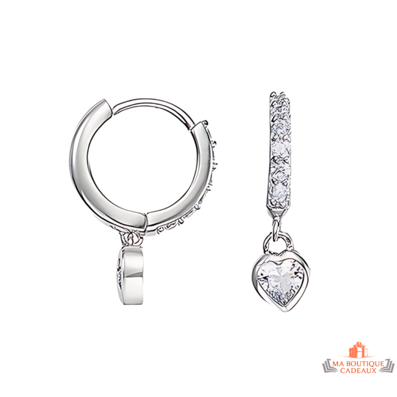 Boucles d'oreilles pendantes en argent 925/°° Carla Nogueres avec cœur en zirconium, garantie 2 ans.