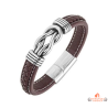 Bracelet Carla Nogueres en acier et cuir marron avec motif tressé, garanti 2 ans.